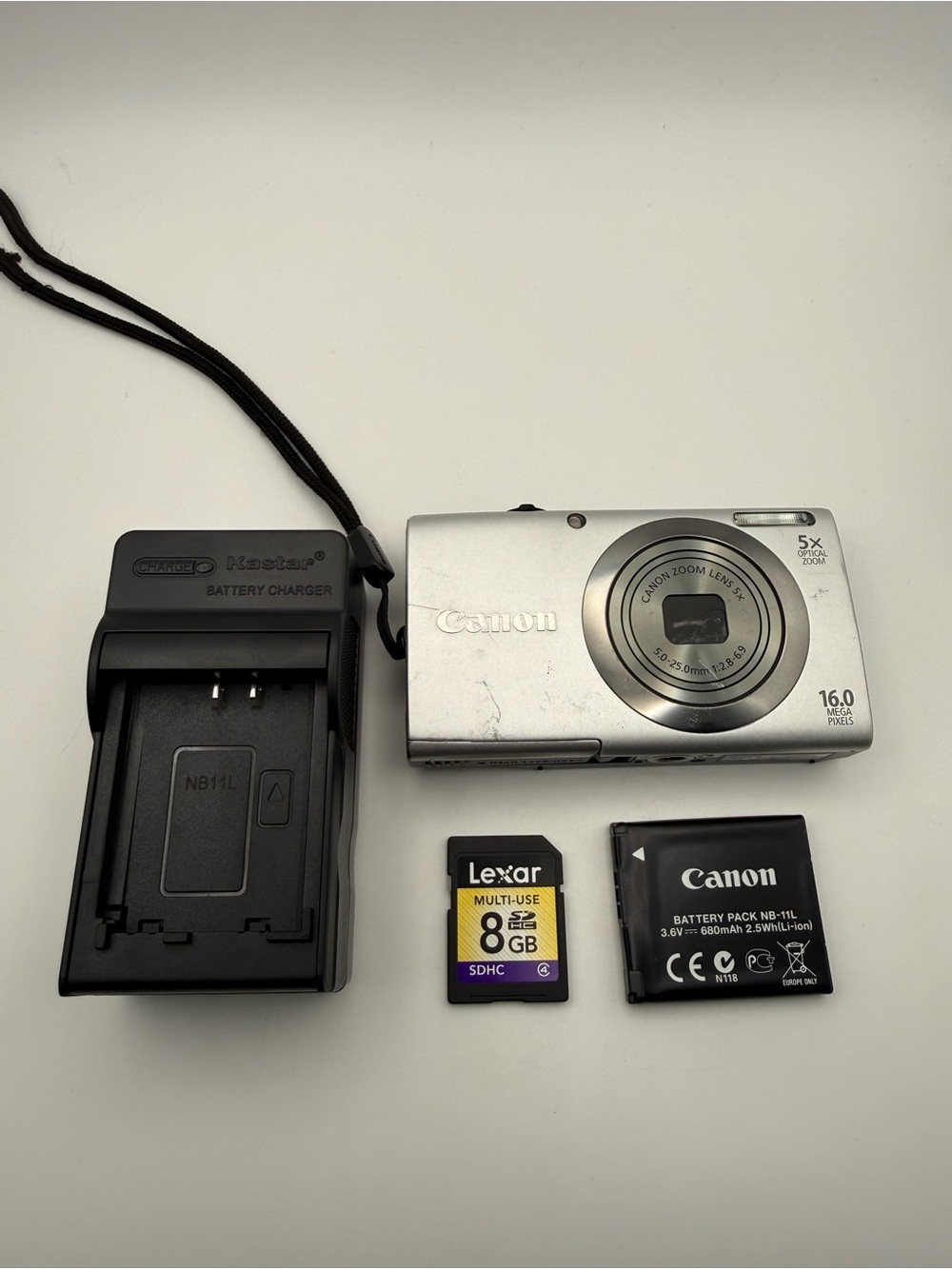 Canon PowerShot Silver Compact Digital Camera + Charger and 8GB SD Card 5X Zoom